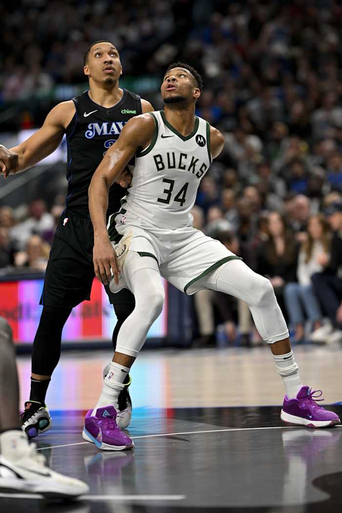  Dallas Mavericks forward Grant Williams (3) and Milwaukee Bucks forward Giannis Antetokounmpo (34) look for the rebound d